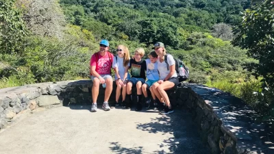 Capturing priceless memories with the stunning Rincon de la Vieja Volcano as a backdrop. Cherishing this special moment with family amidst the beauty of nature on a volcanic hike.